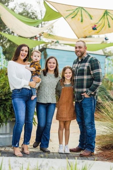 A Family of Five with Two Girls and a Baby Boy Standing by an Urban Old Brick Wall Stock Image - Image of child, family: 208761813