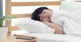 asian boy sleeping and wake up after cal... | Stock Video | Pond5